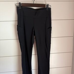 Lululemon Black Leggings Size 6 with reflective pockets, zipper
